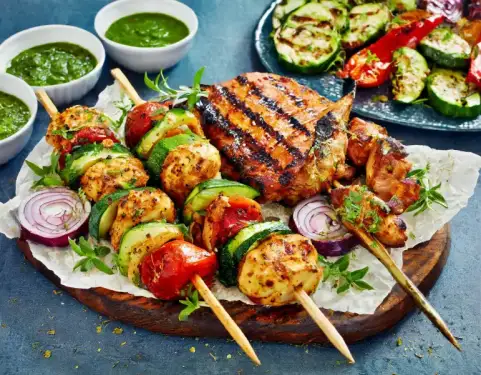 Click Here To Enlarge This Photo Of BBQ Flavoured Chicken Kebabs With Grilled Veggies & Minted Lamb Chops